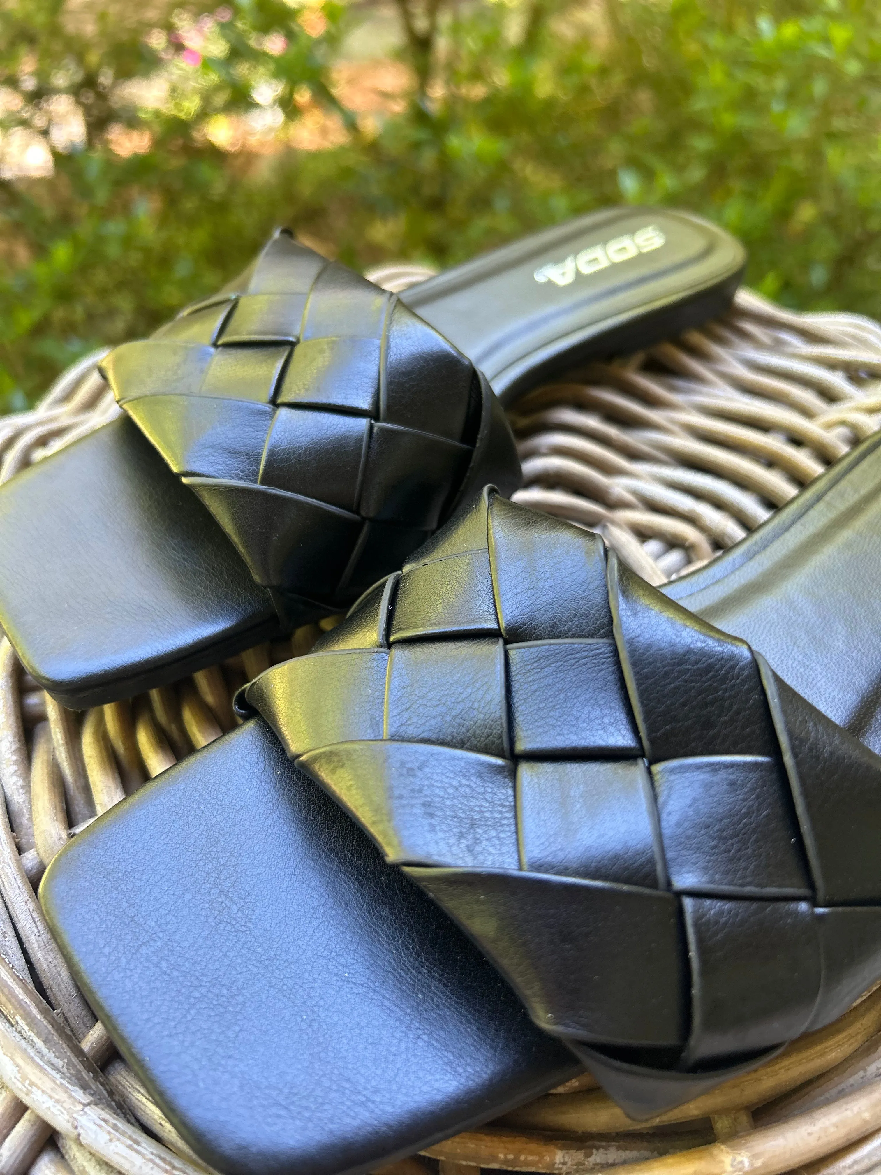 Black woven slide